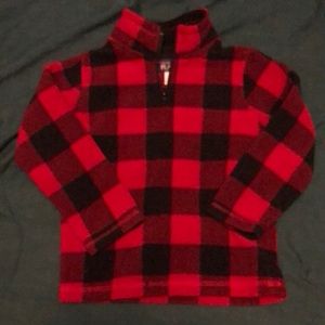 Black/red plaid 100% polyester, super soft.